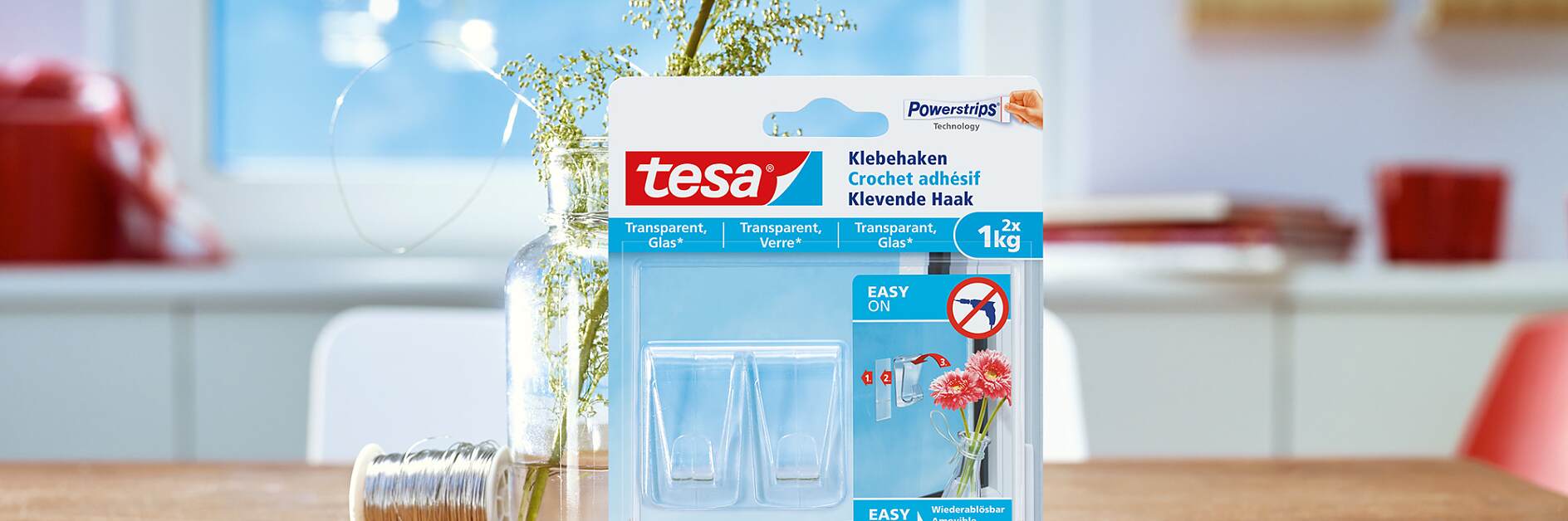 使用tesa®透明玻璃用无痕挂钩（1公斤）的方法。