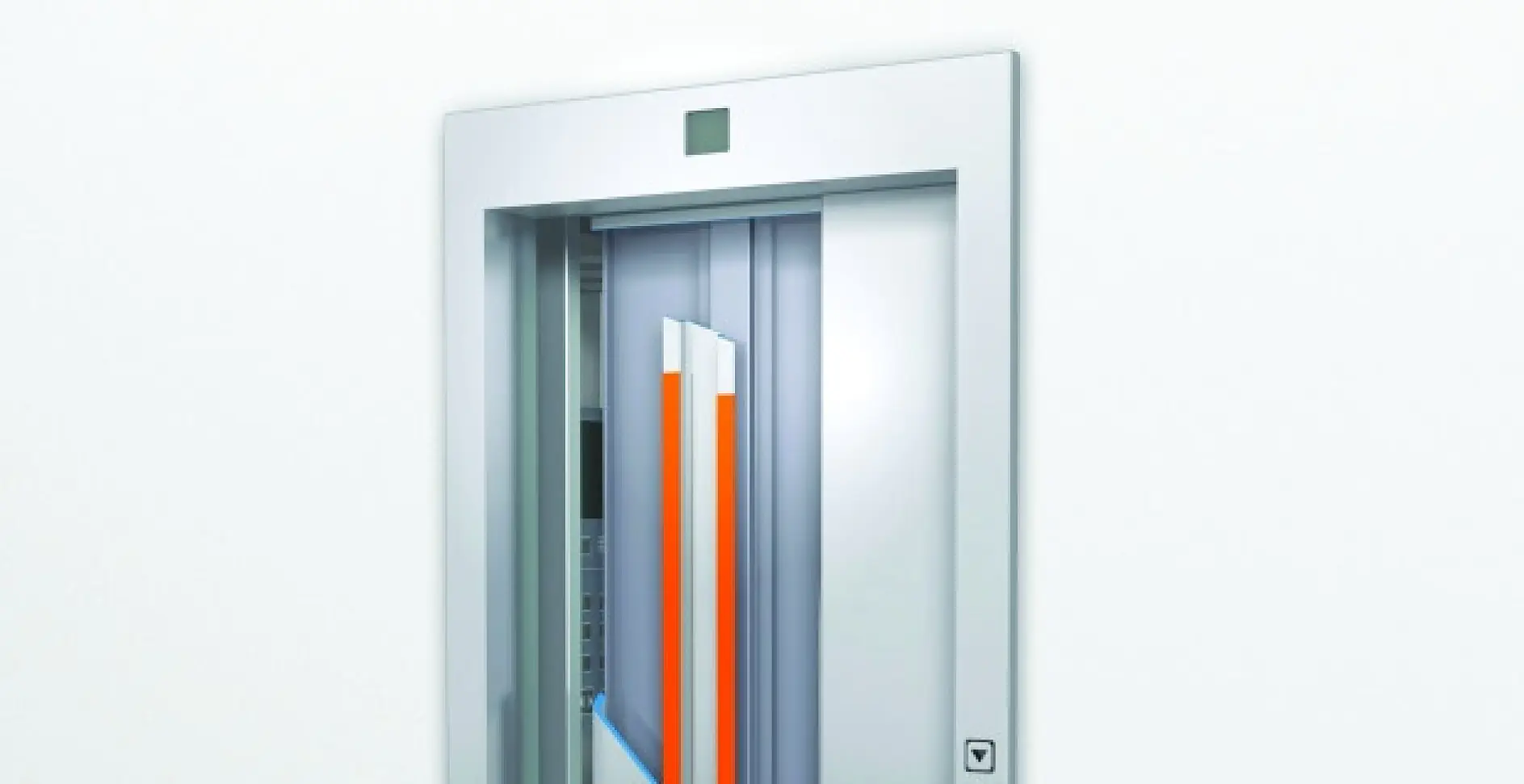 Modern elevator door with a sleek silver frame and a vertical orange and gray panel in a white indoor setting. (This text has been generated by AI)