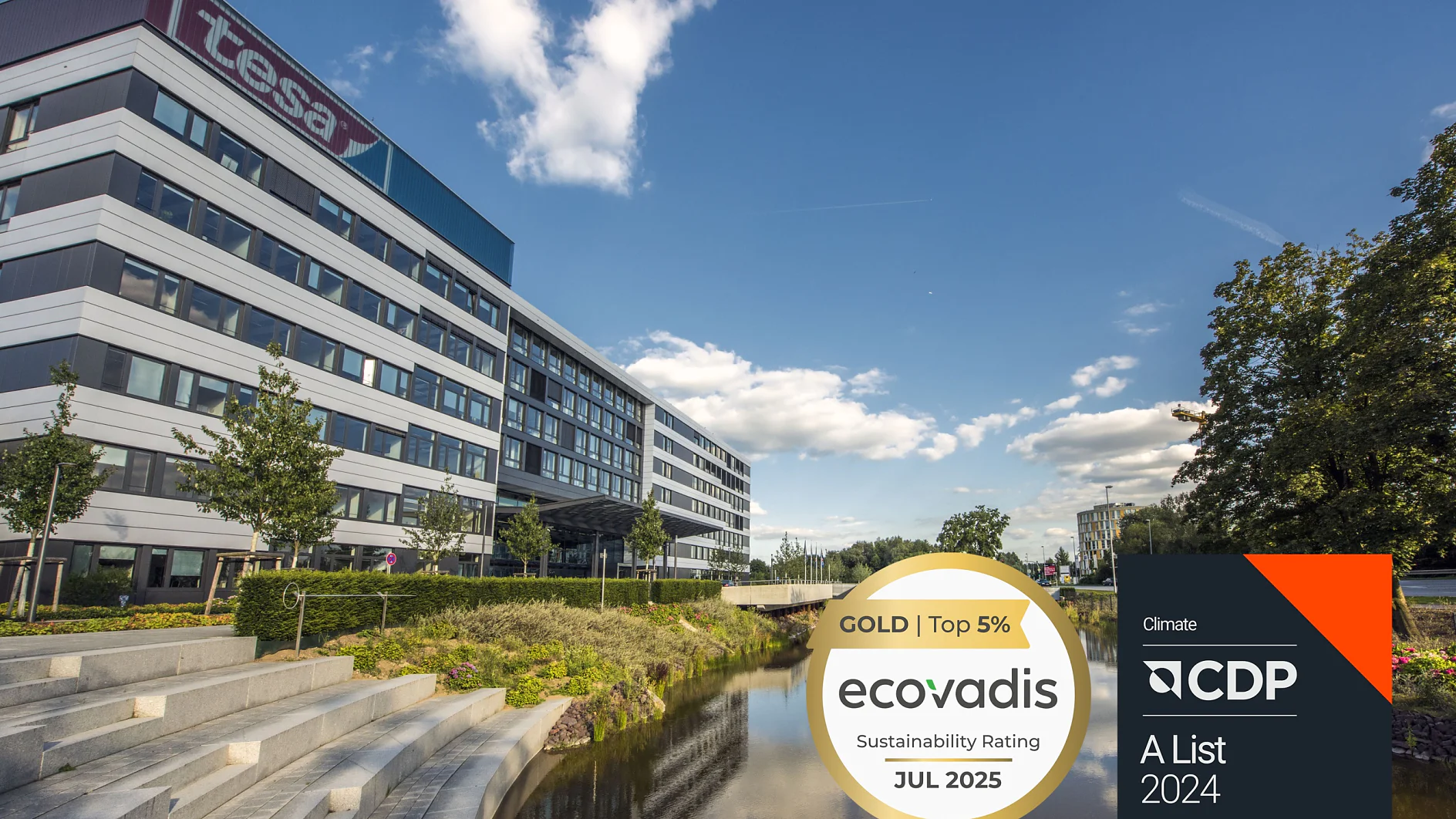 A modern office building with a large tesa tape sign, landscaped steps, a canal, and trees. Overlay displays EcoVadis Gold Sustainability Rating for July 2025 and CDP A List 2024 for climate. (This text has been generated by AI)