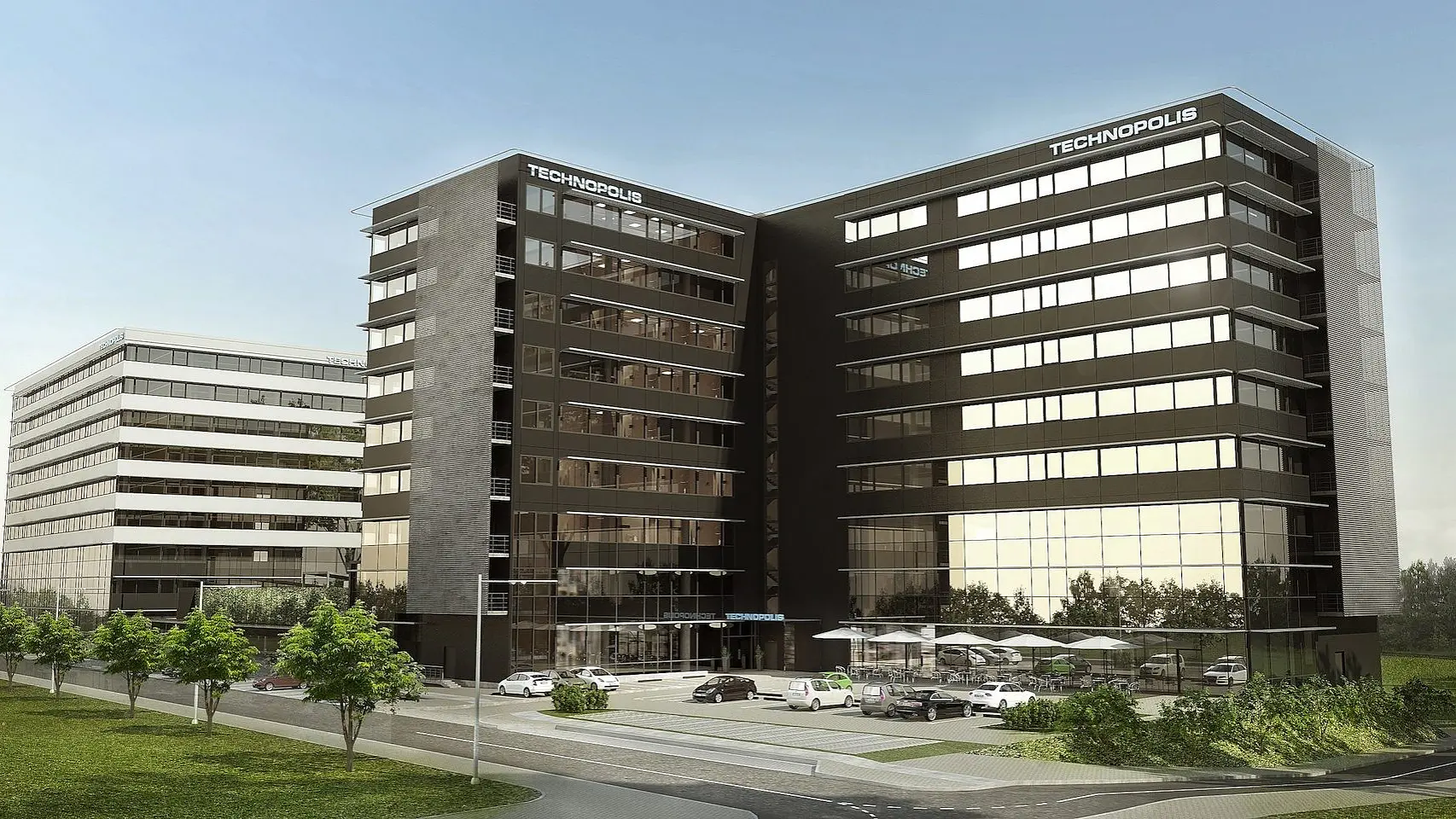 Kaasaegne bürookompleks kahe peamise mitmekorruselise klaas- ja terashoonega, millel on silt Technopolis. Esiplaanil on väike parkla ja haljastus. Taevas on selge, mis viitab päevaajale. (This text has been generated by AI)